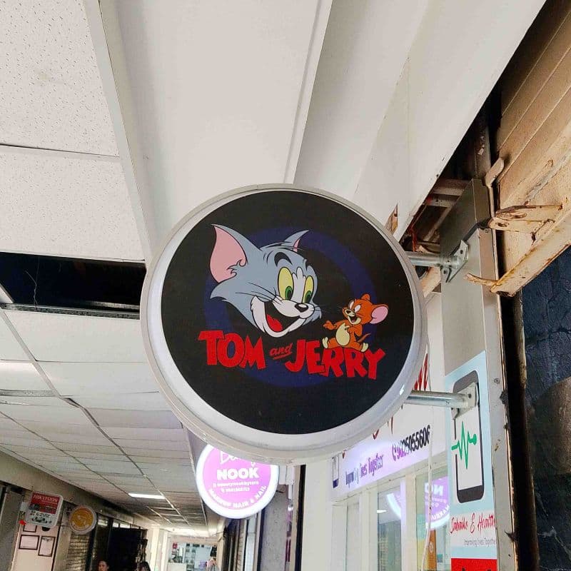 Tom And Jerry Shop logo